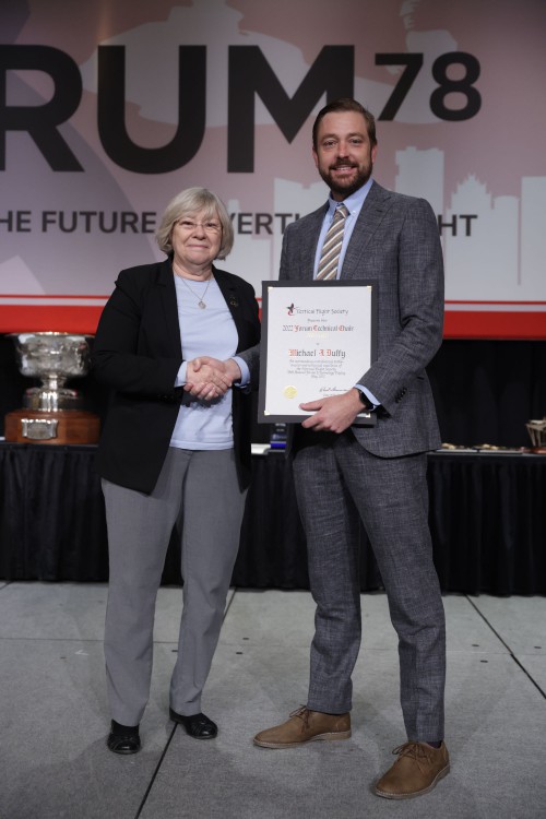 VFS Technical Director Prof. Marilyn J. Smith of Georgia Tech, congratulates the Forum 78 Technical Chair, Michael J. Duffy of Electric Power Systems (EPS) for his prodigious efforts over the past two years to make Forum 78 so successful. (VFS photo by Warren Liebmann. CC-BY-SA 4.0)