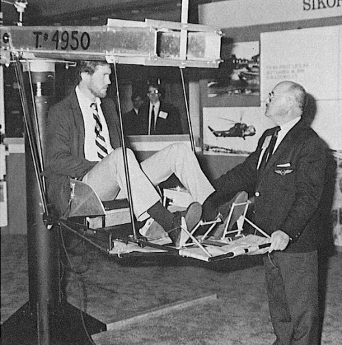 At Exhibits, Sergie Sikorsky assists a "pilot" in a demonstration model of his father's VS-300.

AHS (now VFS) 45th Annual Forum and Technology Display held May 22-24, 1989 at Boston, Massachusetts, USA