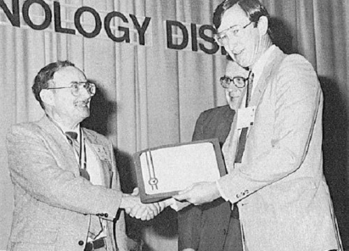 The Alexander A. Nikolsky Honorary Lectureship presented to Kenneth B. Amer for his lecture, "A "NEW" Philosophy of Structural Reliability, Fail Safe Versus Safe Life." In photo, AHS Technical Chairman Andy Logan (right) honors Nikolsky Lecturer Ken Amer, as President Crawford assists.
AHS (now VFS) 44th Annual Forum and Technology Display, July 16-18, 1988 at Washington, D.C., USA