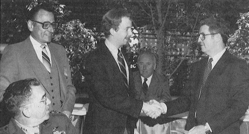 Todd R. Quackenbush (center) receives congratulations from William Walls (right) and Joe Mallen after he was named the winner of the Society's Robert L. Lichten Award. The Lichten Award is presented to the author of the best technical paper delivered at a regional meeting of the AHS during the previous year and is intended to foster the professional growth of young engineers. Quackenbush's paper. was entitled, "Testing and Evaluation of a Stall Flutter Suppression System Based On Individual Blade Control."
AHS' (now VFS) 39th Annual Forum and Technology Display held May 9-11, 1983 at St. Louise, Missouri, USA