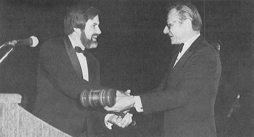 Dick Lewis (left) receives the gavel from Joe Mallen, signifying the beginning of his term as AHS President. During the next year Mallen will serve as Chairman of the Board.

AHS' (now VFS) 39th Annual Forum and Technology Display held May 9-11, 1983 at St. Louise, Missouri, USA